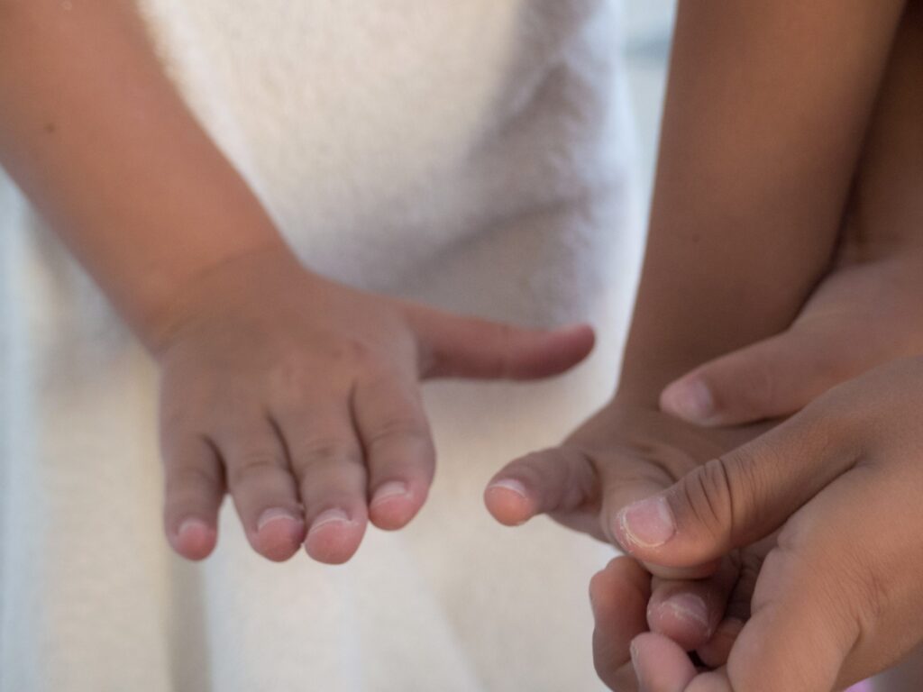 Fine Art Photography Ideas to Capture at Home "Small hands" - Simple but impressive photo of children's hands.