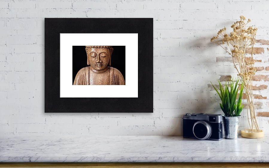 Photography of the Buddha printed on high quality paper with thick black frame.