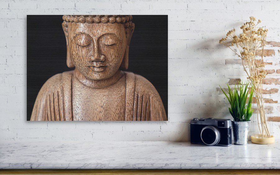 Art print of The Buddha image on the wooden board.