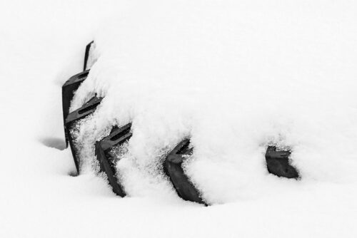 Tyre in the snow – minimalist photography - Art print by Martin Vorel
