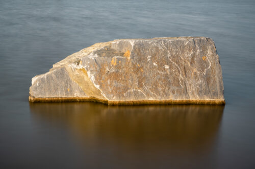 A rock in the water – Fine Art Photography Print - Art print by Martin Vorel