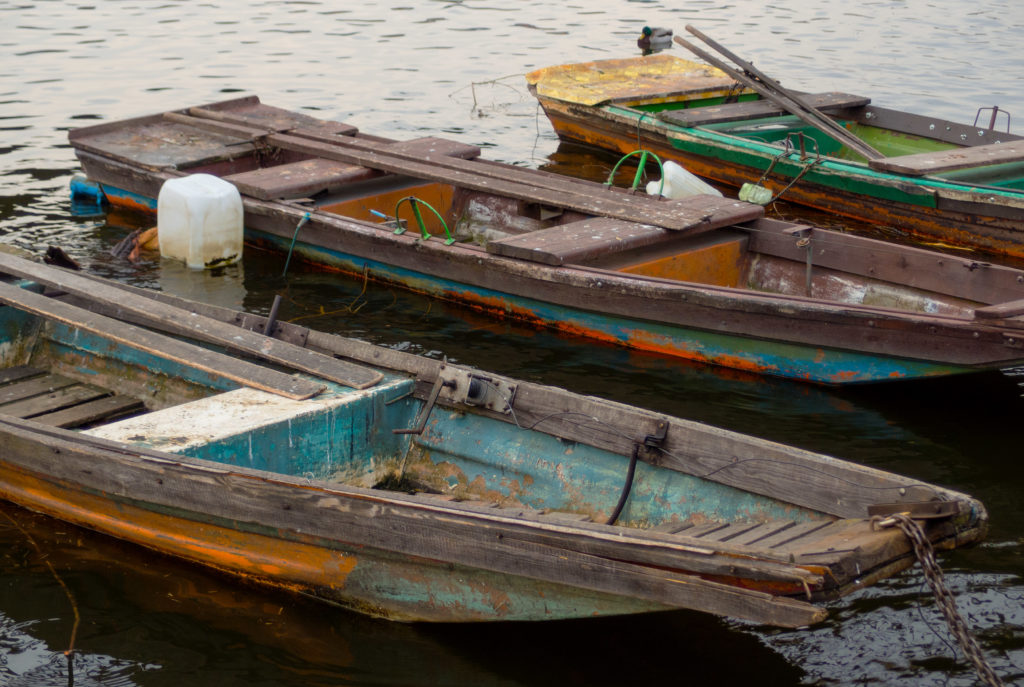 Three old colorful wooden boats