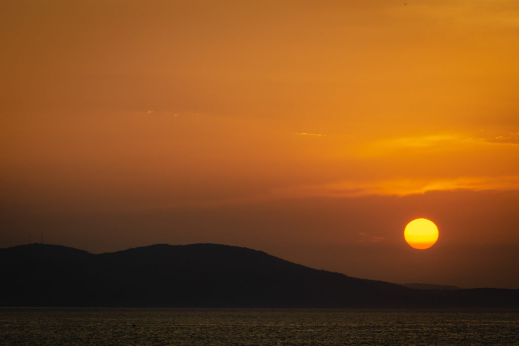 Minimalist photography of a sunset over the sea in Croatia.