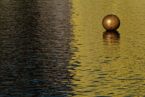 Abstract photograph of a buoy in water