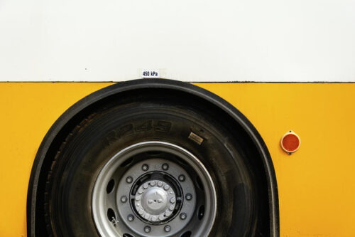 Yellow Bus Close-up Photography - Art print by Martin Vorel