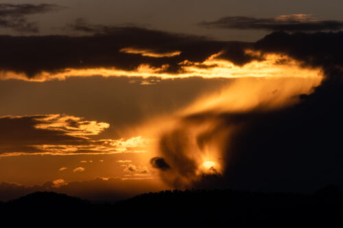 Sunset in the Clouds in an Orange Sky - Fine art photography print for sale