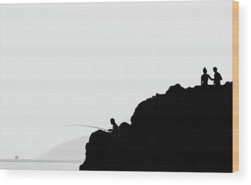 Silhouette people photograph - Wood print for sale, Landscape Wood Prints, silhouettes-on-the-rock-above-the-sea-wood-print