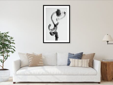 Black and white abstract botanical wall art print displayed in a modern minimalist interior - Abstract