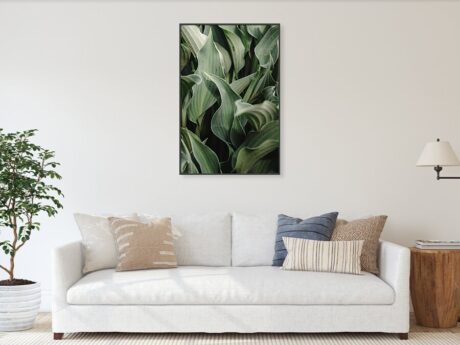 Hosta Leaves Layered Close-Up fine art print in a minimalist living room above a white sofa