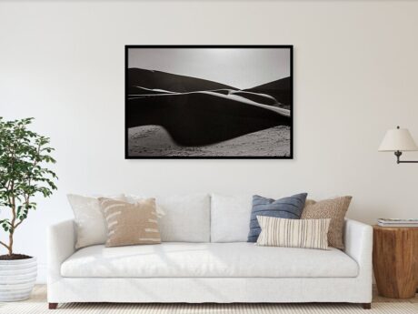 Sand Dune Silhouette II., Morocco - fine art print in a minimalist living room above a white sofa - Desert